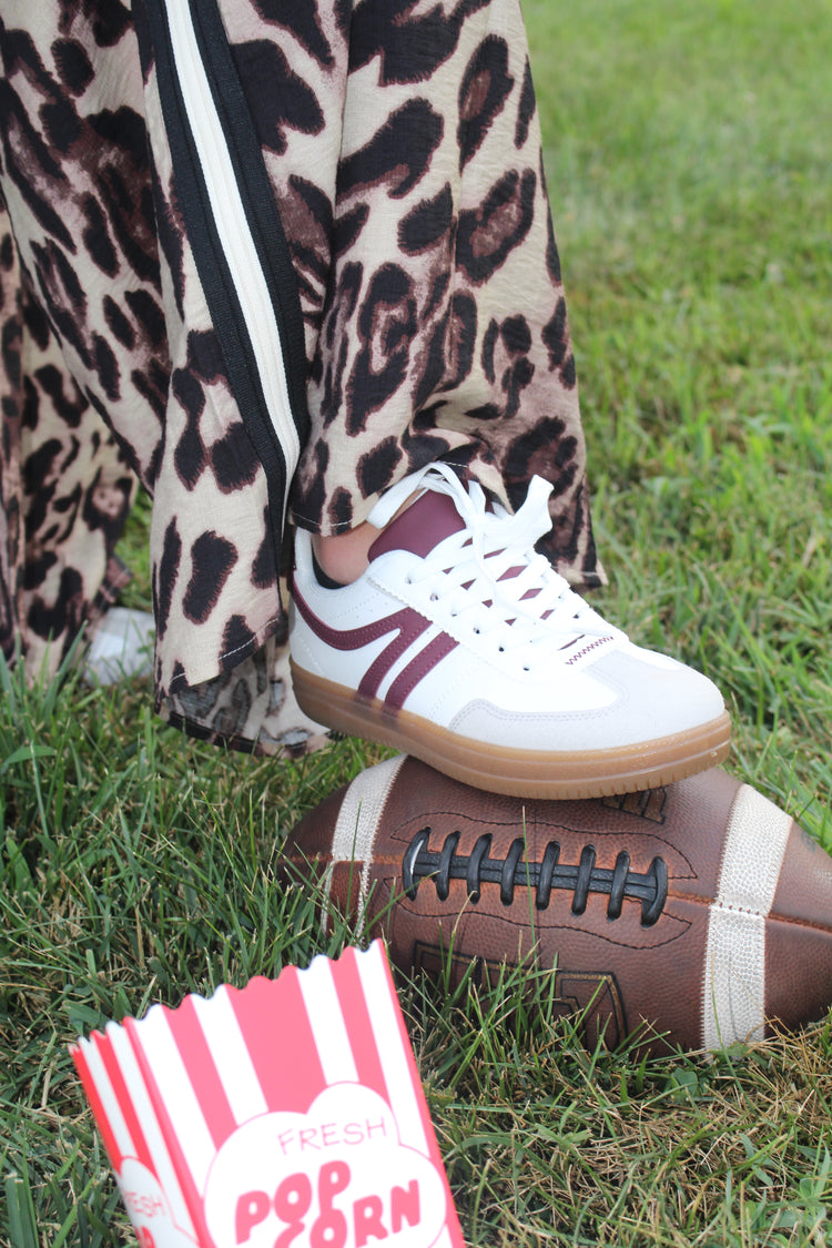 Maroon and White Tennis Shoe