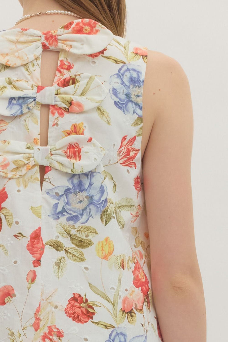 Botanical print sleeveless midi dress featuring eyelet fabric detail