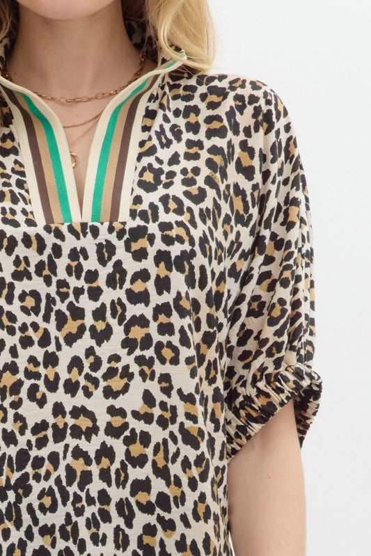 Leopard print high neck elasticated sleeve band dolman top featuring accented multicolor rib band split neck